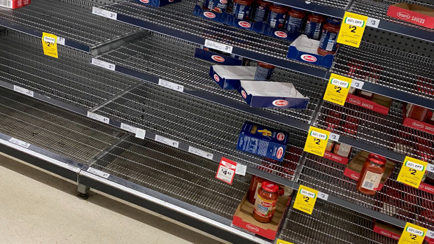 Supplies of staples such as pasta, rice, UHT milk and canned foods were running low at Woolworths and Coles amid panic hoarding. 