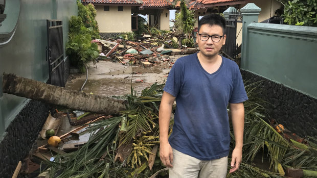 Kevin Resali, 36, outside the villa in Anyer where he and his family were staying when the tsunami hit.
