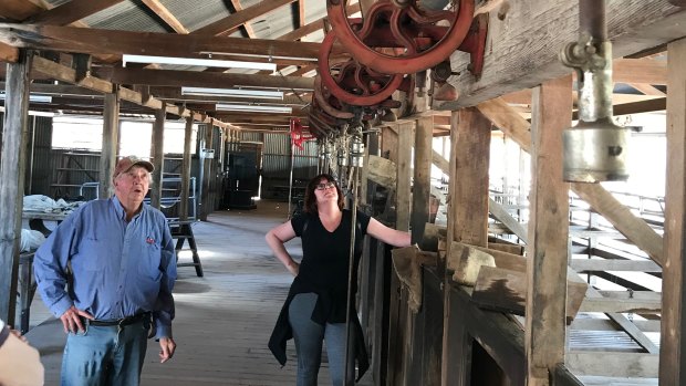 Bob “Willow” Wilson takes a tour party through the heritage-listed wool scour in September. The council would like to have more audio-visual aids through this area.