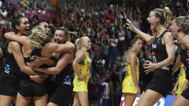 New Zealand players celebrate after winning the Netball World Cup final.