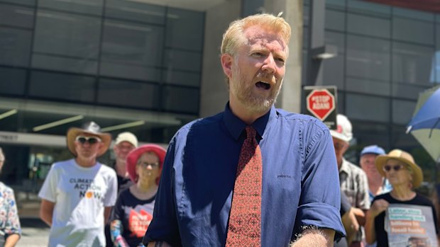 Environmental activist Ben Pennings speaking outside the Supreme Court in Brisbane on Thursday.