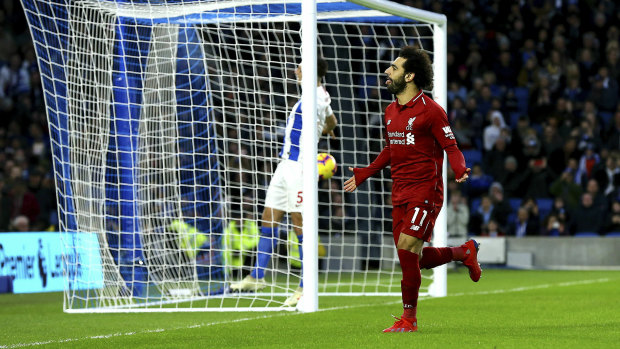 Spot on: Mohamed Salah celebrates after converting the only goal in Liverpool's victory.