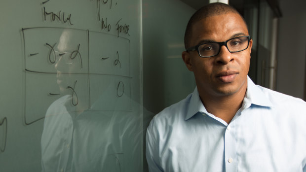 Economist Roland Fryer has been placed on administrative leave for two years. 