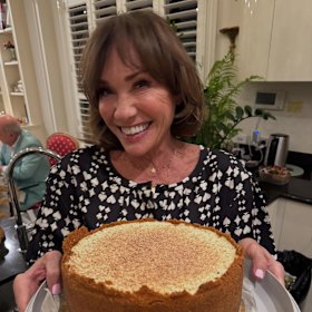 Ann Peacock at a recent party, but who is the man in the corner who looks an awful lot like Alan Jones.