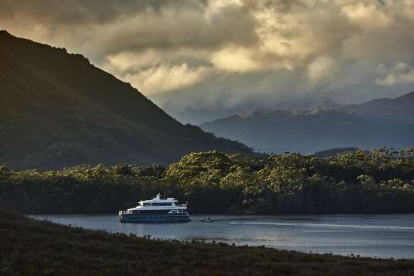 Luxury catamaran Odalisque III and tender in Bathurst Harbour.