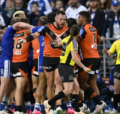 Tigers forward David Klemmer remonstrates with referee Kasey Badger.