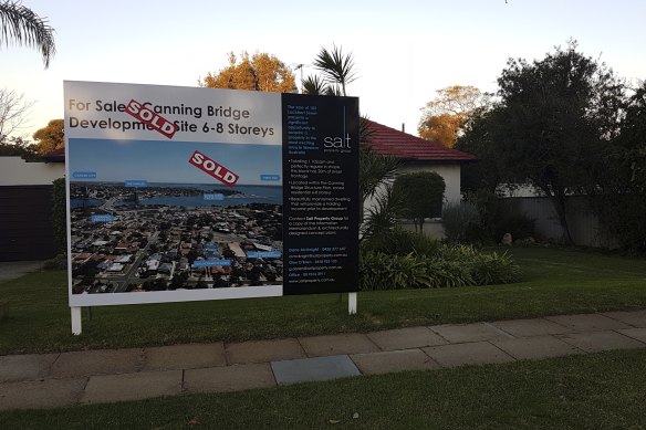 An example of the type of signage now on homes for sale within the redevelopment zone. 