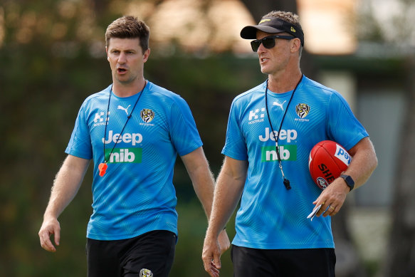 Andrew McQualter (left) will step up as interim coach after Damien Hardwick’s shock resignation.