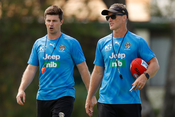 Andrew McQualter (left) has taken the reins from Damien Hardwick.