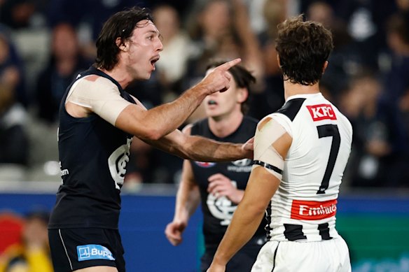 Ollie Hollands (left) reacts after Josh Daicos (right) gave away a free kick that gave the Blues a chance to draw the game.