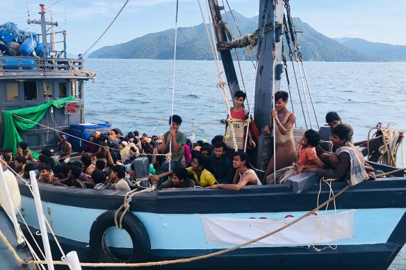 At least two dozen Rohingyan migrants died on the boat and many more boats are believed to remain adrift. 
