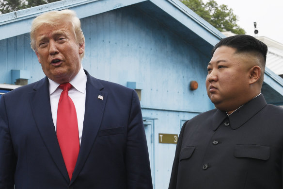 President Donald Trump meets North Korean leader Kim Jong-un at the border village of Panmunjom in the Demilitarised Zone, South Korea on Sunday.