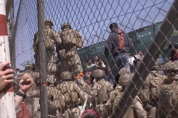 US Marines at Abbey Gate before a suicide bomber struck outside Hamid Karzai International Airport on August 26, 2021.