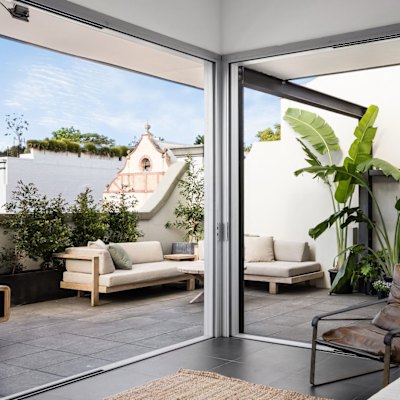 ‘On top of the world’: Inner west penthouse shatters record at auction