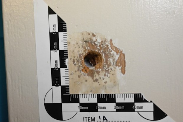 Investigators discovered evidence of bullet damage during a sweep of the Paddington home.