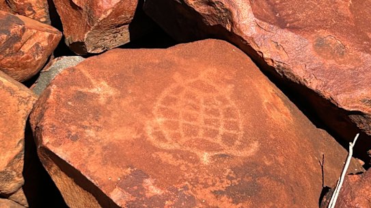 More than 1 million petroglyphs are scattered around Murujuga National Park, which overlooks Woodside’s Karratha operations.
