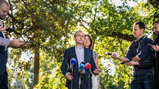 Greens leader Adam Bandt with Greens senator Steph Hodgins-May in the Treasury Gardens on Monday.
