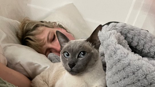 Sally Spicer with her cat Nina during her illness. 