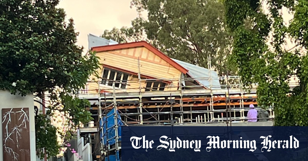 House slips as thunderstorms, hail batter Brisbane