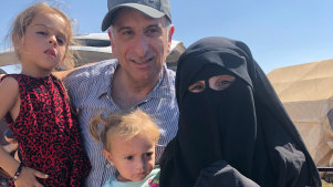 Kamalle Dabboussy with his daughter Mariam and her daughters Aisha (left) and Fatema in al-Hawl camp in north-eastern Syria.