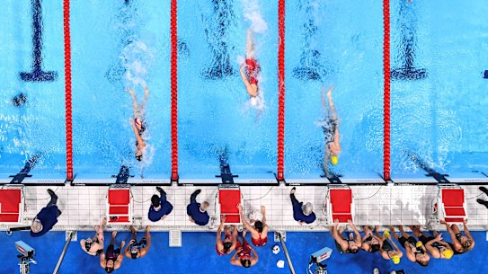 Cate Campbell touches the wall just before Abbey Weitzeil in the women’s 4x100m medley relay.