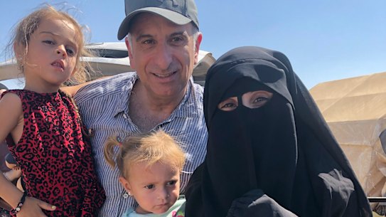 Kamalle Dabboussy with his daughter Mariam Dabboussy (right) and Mariam’s daughters Aisha (left) and Fatema (2nd from right) in al-Hawl camp in North East Syria.