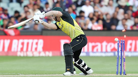 David Warner was bowled trying a right-handed cover drive.