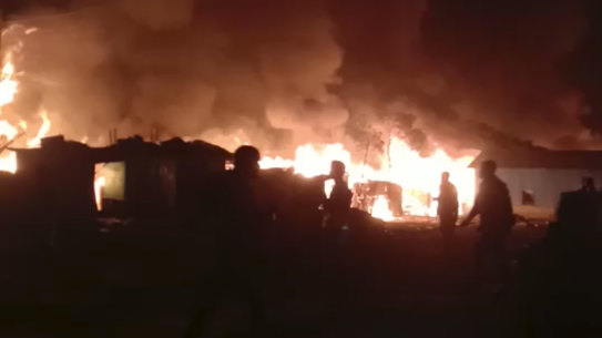 A fire races through the sprawling Rohingya Nayapara Camp in Cox's Bazar district in Bangladesh on Thursday.