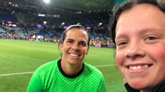 Katie Campbell, 15, with Matilda’s Lydia Williams.