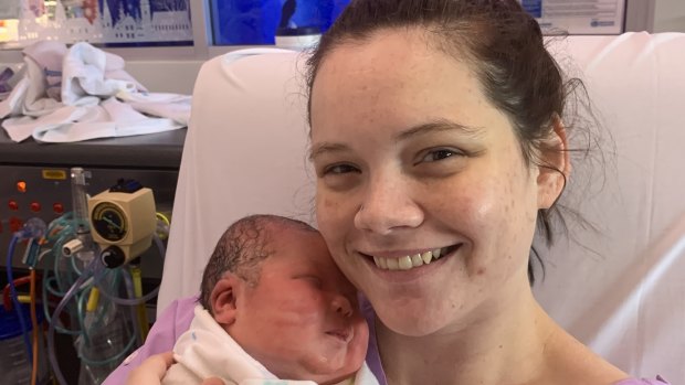 High-school sweethearts welcome their New Year's Day baby into the world