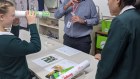 PLC Sydney physicist-in-residence Dr Stephanus Van Heerden helps students with science projects.