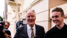 Kristo Langker and lawyer Mark Davis outside Newtown local Court