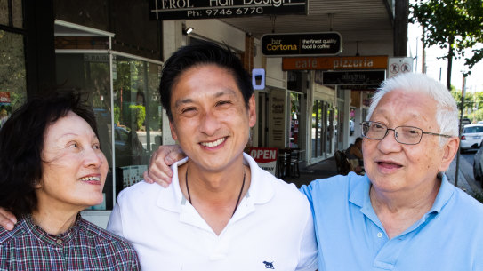 Jason Yat-sen Li, who is likely to win the seat of Strathfield when the result is declared, with his proud parents Pansy and George. 