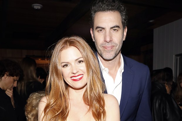 Sacha Baron Cohen and Isla Fisher at Estrella on January 6, 2017 in West Hollywood, California.