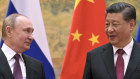 Vladimir Putin, left, and Xi Jinping during their meeting in Beijing on Friday.