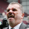 Ange Postecoglou celebrates after winning the Scottish Premiership.