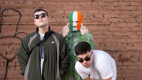 Mo Chara (left) with Kneecap bandmates DJ Próvaí and Móglaí Bap, in Melbourne in March.