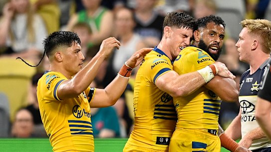 The Eels celebrate a try.