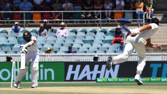 Right on time: Starc caps off his 10-wicket haul with a beauty to dismiss Fernando.