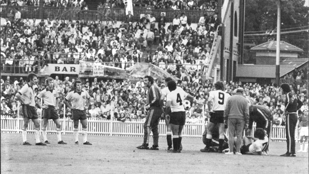 Star Midfielder, Ray Baartz is felled by a karate chop in a friendly against Uruguay just prior to the World Cup in 1974.