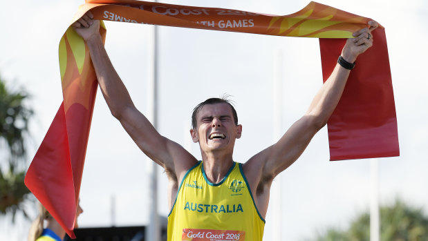 Dane Bird-Smith of Australia crosses the finish line to win gold.