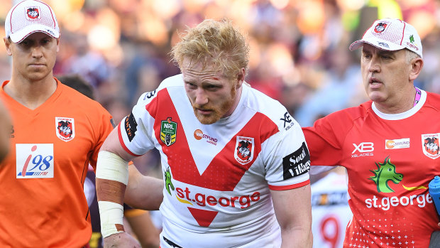 James Graham leaves the field after suffering a head knock in 2018.