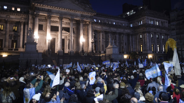 Demonstrators rally against corruption outside Congress in Buenos Aires,.