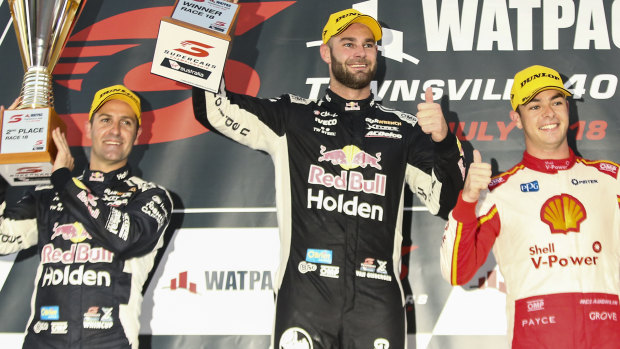 Winners are grinners: Shane Van Gisbergen on the podium with second-placed teammate Jamie Whincup and Scott McLaughlin.