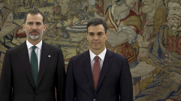 Spain's King Felipe VI, left, with Spain's new Prime Minister Pedro Sanchez, who was sworn in at the Zarzuela Palace in Madrid, on Saturday.