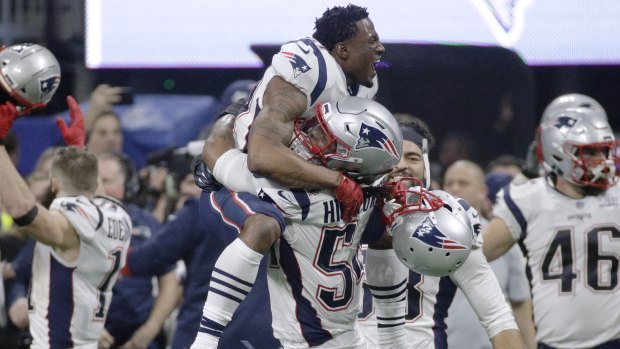 Not long after celebrating their win, many New England Patriots players, including Dont'a Hightower (centre), said they would skip a White House visit.