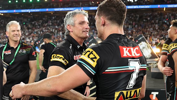 Nathan Cleary celebrates with his father and coach Ivan Cleary.