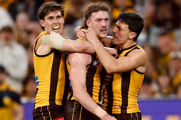 Will Day, Josh Weddle and Massimo D’Ambrosio celebrate a goal.