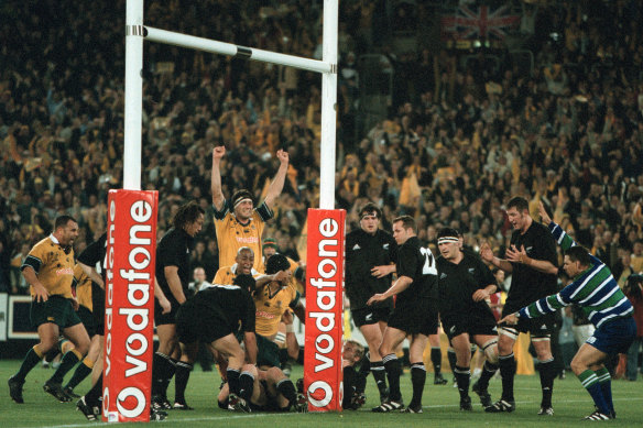 Powerhouse No. 8 Toutai Kefu scoring the match-winning try that sent John Eales out a winner.
