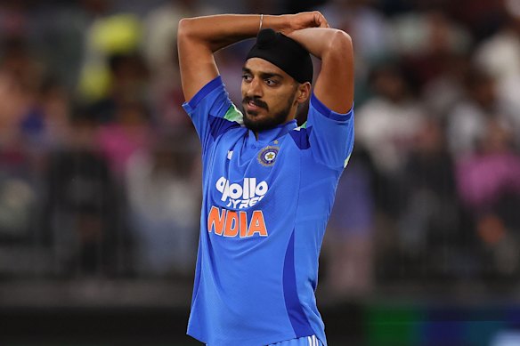 Arshdeep Singh of India looks on. 